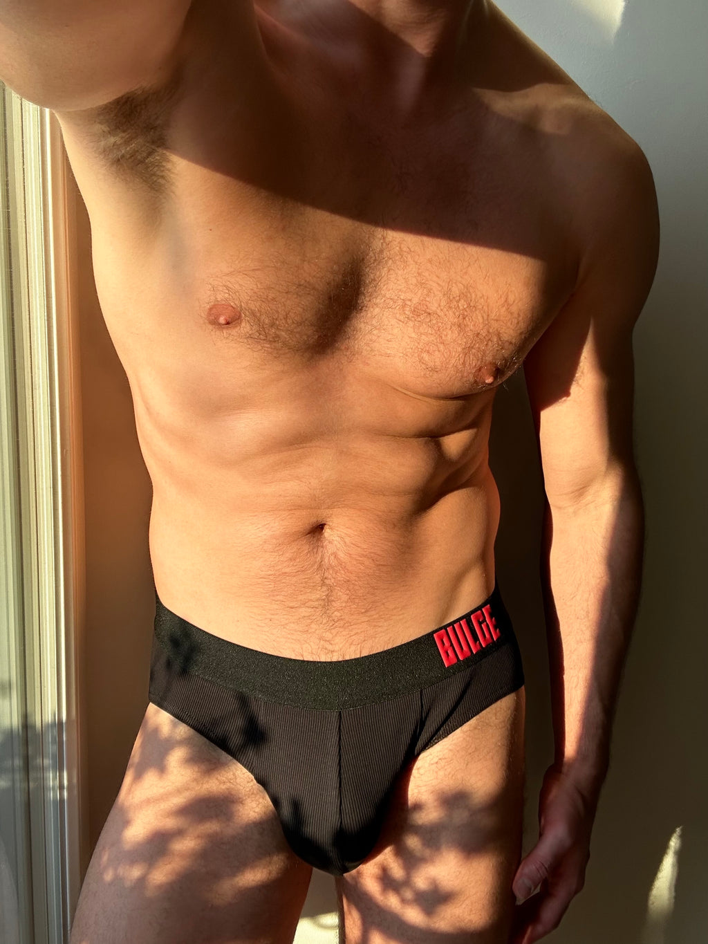 BRIEFS BULGE BLACK · RED LOGO