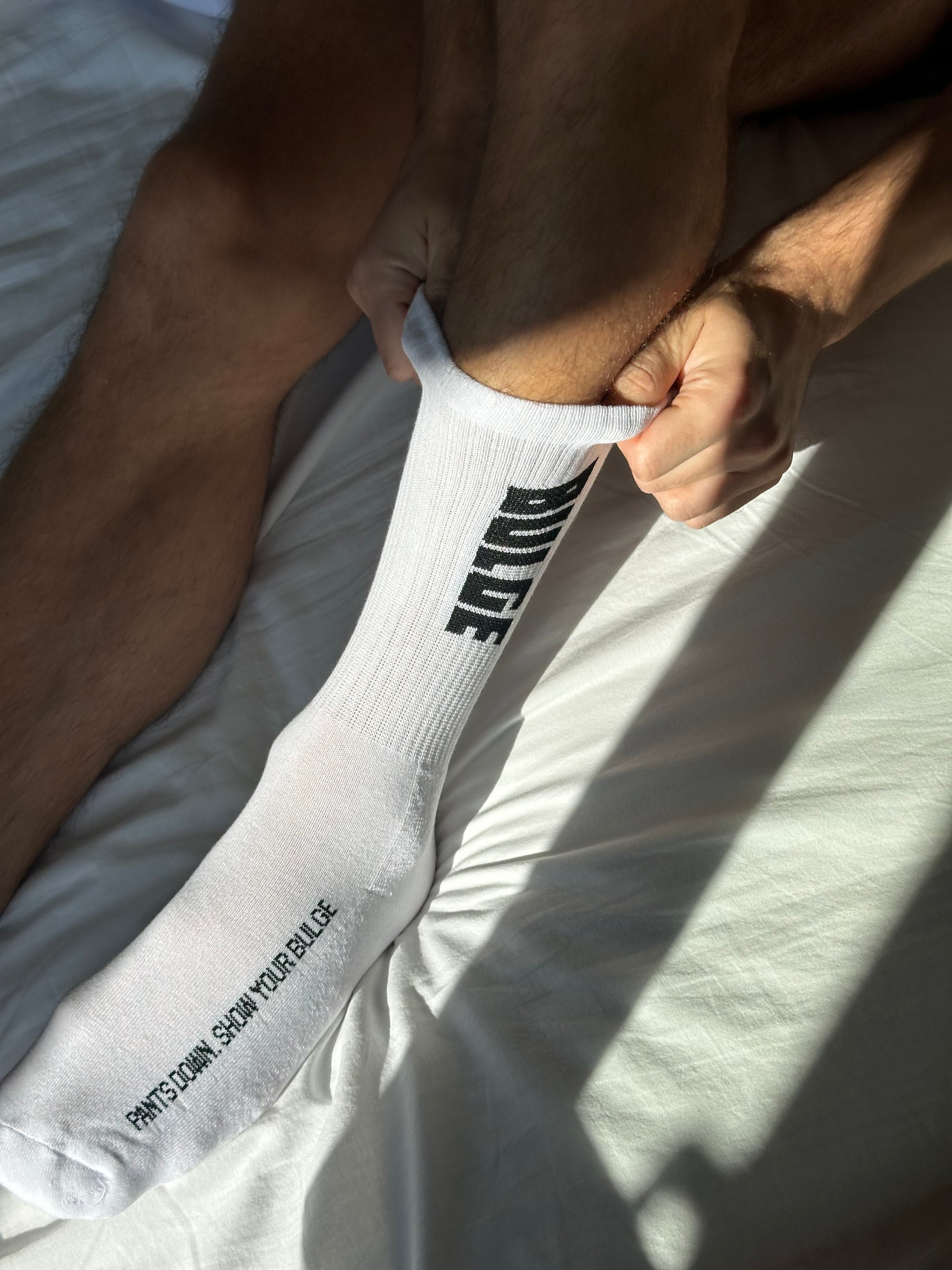 SOCKS SHOW YOUR BULGE WHITE · BLACK LOGO